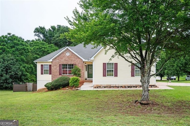 409 Cold Springs Ln, Mcdonough, GA 30252 - view of front of house with a front yard and brick siding