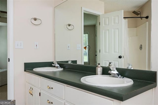 409 Cold Springs Ln, Mcdonough, GA 30252 - full bath featuring double vanity and a shower with shower curtain