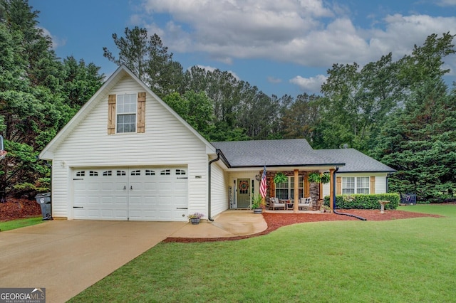 160 Laurel Ln, Social Circle, GA 30025 - view of front of property with a porch, a front yard, driveway, and a garage