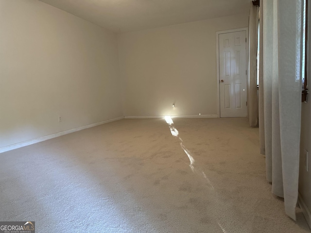 984 Morrow Rd, Morrow, GA 30260 - empty room with baseboards and light colored carpet
