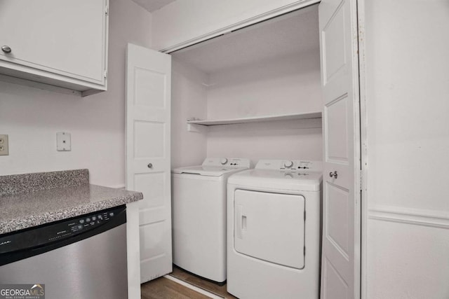 5157 Roswell Rd Unit 1, Atlanta, GA 30342 - laundry room featuring washing machine and clothes dryer and wood finished floors