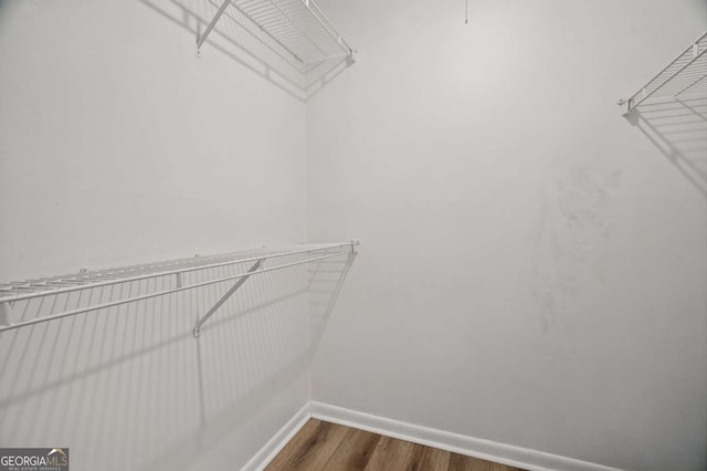 5157 Roswell Rd Unit 1, Atlanta, GA 30342 - spacious closet with dark wood-type flooring