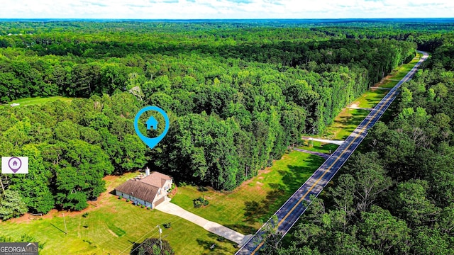 6830 Peeksville Rd, Mcdonough, GA 30252 - drone / aerial view of a heavily wooded area