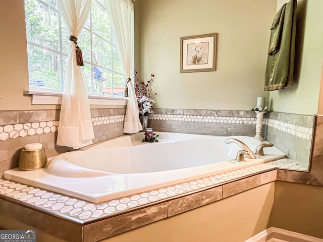 6830 Peeksville Rd, Mcdonough, GA 30252 - full bath with a bath and a wainscoted wall