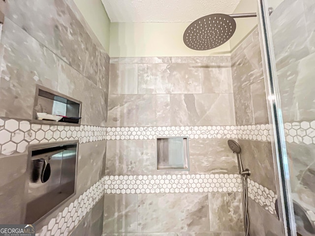 6830 Peeksville Rd, Mcdonough, GA 30252 - full bath with tiled shower, a textured ceiling, and tile walls