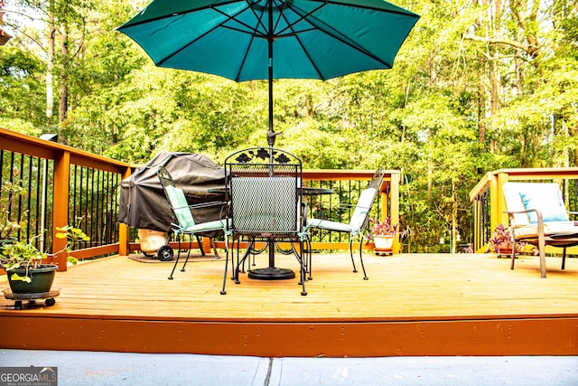 6830 Peeksville Rd, Mcdonough, GA 30252 - wooden terrace featuring outdoor dining area