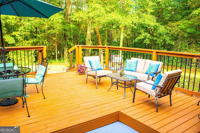 6830 Peeksville Rd, Mcdonough, GA 30252 - wooden deck featuring an outdoor living space