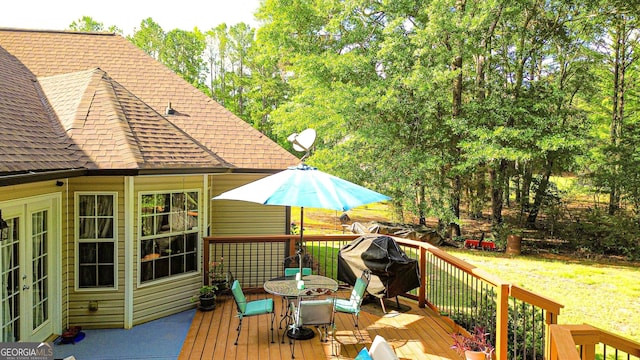 6830 Peeksville Rd, Mcdonough, GA 30252 - deck with outdoor dining area and french doors