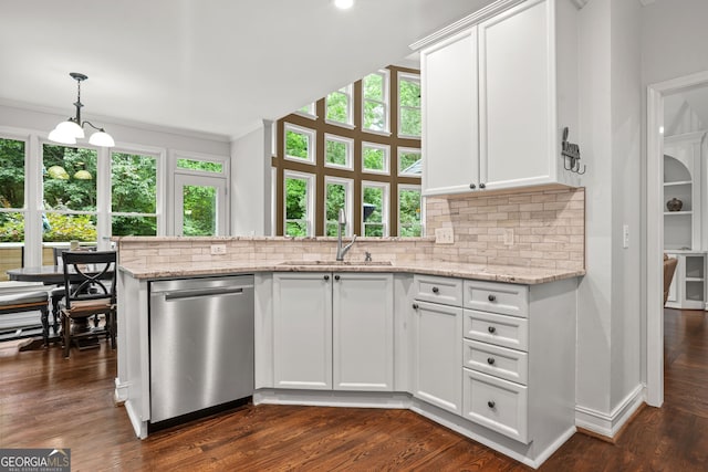 702 Crescent Cir, Canton, GA 30115 - kitchen featuring dishwasher, healthy amount of natural light, a sink, tasteful backsplash, and crown molding