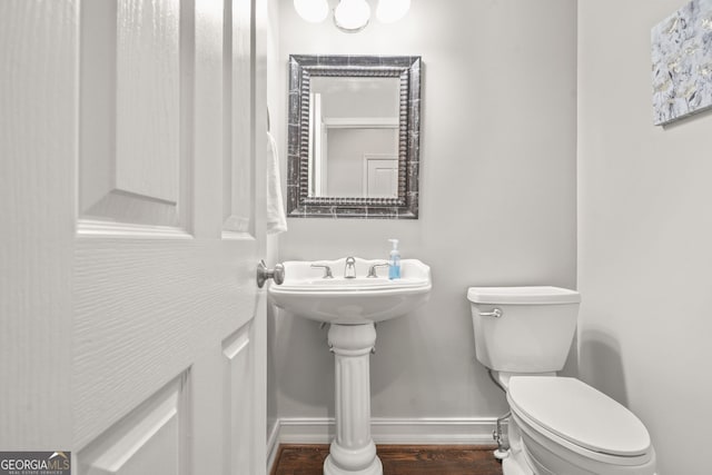 702 Crescent Cir, Canton, GA 30115 - bathroom with toilet, baseboards, and wood finished floors