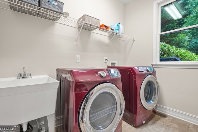 702 Crescent Cir, Canton, GA 30115 - laundry room with separate washer and dryer, baseboards, and tile patterned floors