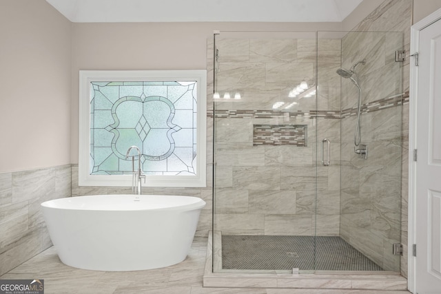 702 Crescent Cir, Canton, GA 30115 - full bathroom featuring a freestanding bath, a shower stall, and tile walls