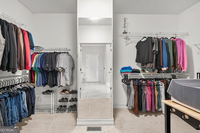 702 Crescent Cir, Canton, GA 30115 - spacious closet featuring carpet flooring