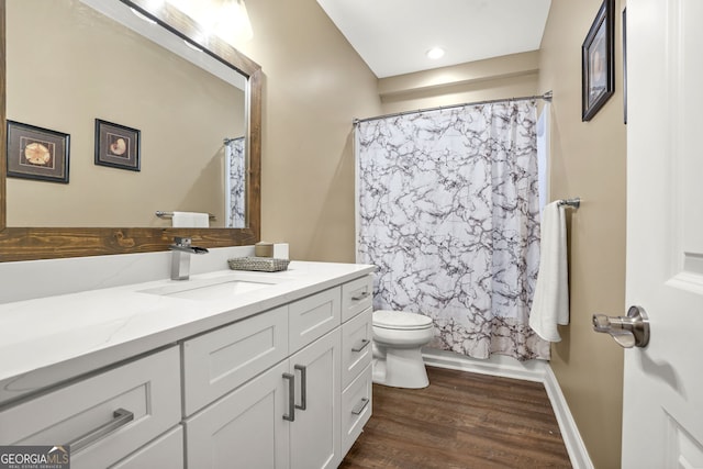 702 Crescent Cir, Canton, GA 30115 - bathroom with vanity, toilet, wood finished floors, and a shower with shower curtain