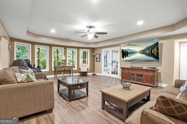 702 Crescent Cir, Canton, GA 30115 - living room with a tray ceiling, ceiling fan, baseboards, light wood-style flooring, and recessed lighting