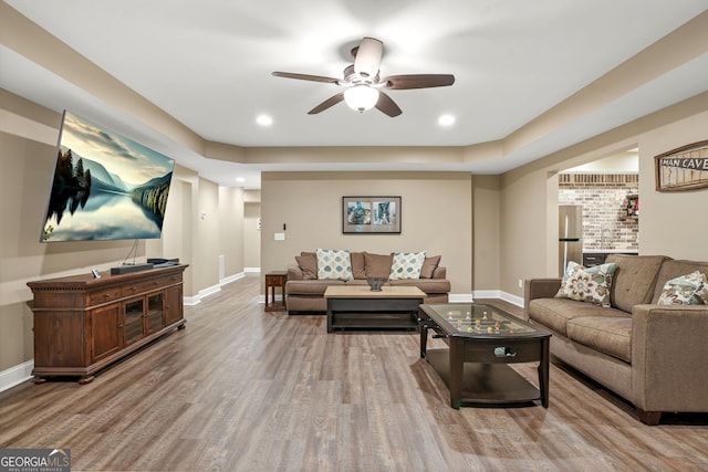 702 Crescent Cir, Canton, GA 30115 - living area featuring a ceiling fan, wood finished floors, baseboards, recessed lighting, and a raised ceiling