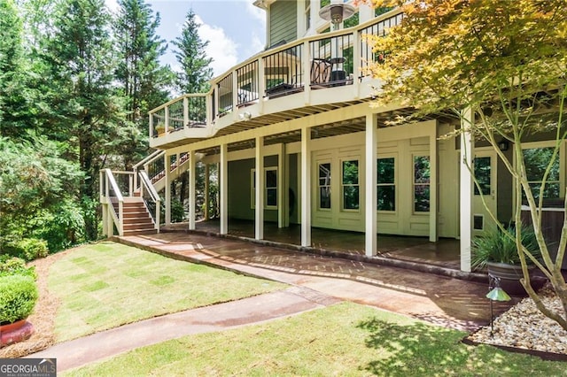 702 Crescent Cir, Canton, GA 30115 - back of house with a deck, stairs, a patio area, and a yard