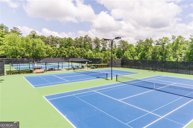 702 Crescent Cir, Canton, GA 30115 - view of tennis court featuring community basketball court