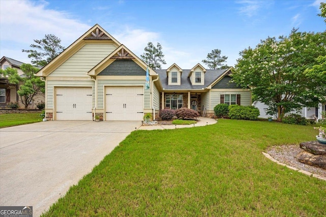 161 Presidents Way, Forsyth, GA 31029 - view of front of house featuring driveway, a front lawn, and a garage