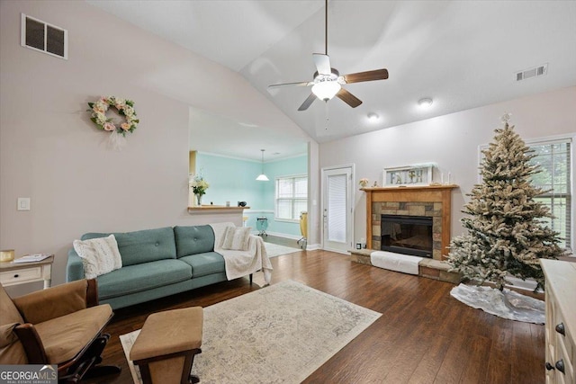 161 Presidents Way, Forsyth, GA 31029 - living area with ceiling fan, lofted ceiling, wood finished floors, and a stone fireplace