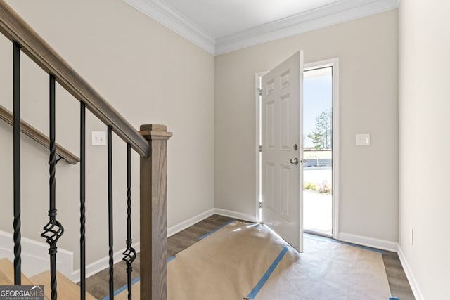 2721 Fareed St, Douglasville, GA 30135 - foyer with crown molding, wood finished floors, stairway, and baseboards