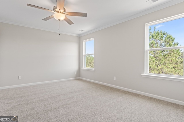2811 Fareed, Douglasville, GA 30135 - spare room featuring baseboards, ornamental molding, plenty of natural light, a ceiling fan, and light colored carpet