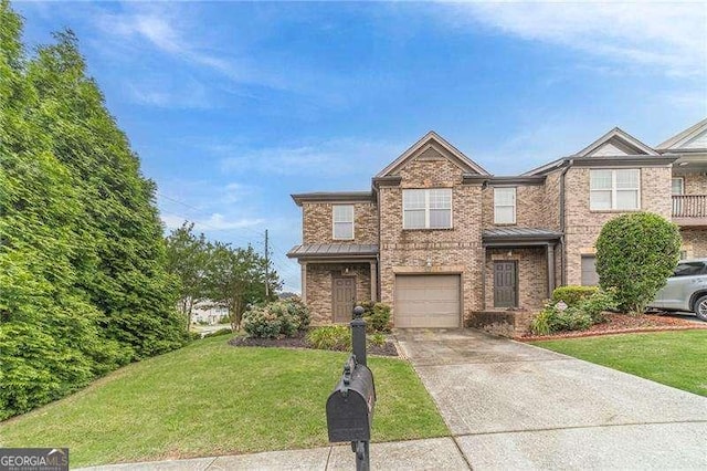 2500 Morgan Chase Dr, Buford, GA 30519 - view of front of house with brick siding, an attached garage, a standing seam roof, and concrete driveway
