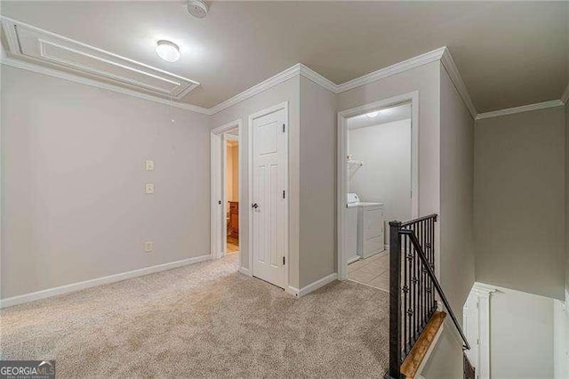 2500 Morgan Chase Dr, Buford, GA 30519 - corridor with attic access, separate washer and dryer, an upstairs landing, light colored carpet, and ornamental molding