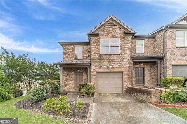 2500 Morgan Chase Dr, Buford, GA 30519 - view of front of home featuring brick siding, a garage, and driveway