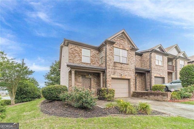 2500 Morgan Chase Dr, Buford, GA 30519 - view of front facade with brick siding, a garage, and driveway