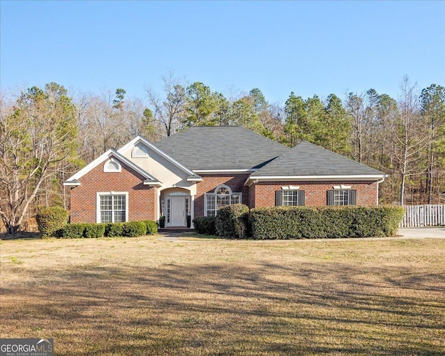 2977 William Few Pkwy, Evans, GA 30809 - view of front of house featuring a front yard and brick siding