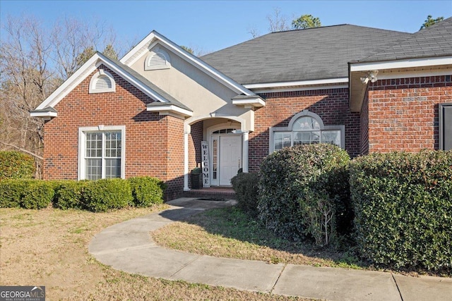 2977 William Few Pkwy, Evans, GA 30809 - view of front of property with brick siding, a front lawn, and roof with shingles
