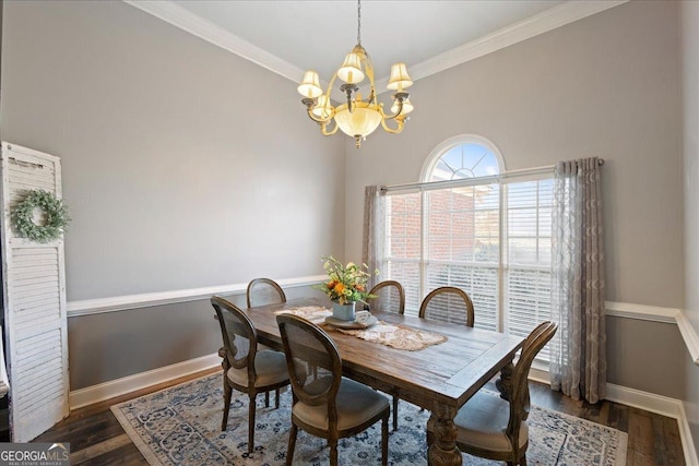 2977 William Few Pkwy, Evans, GA 30809 - dining area with a chandelier, ornamental molding, wood finished floors, and baseboards