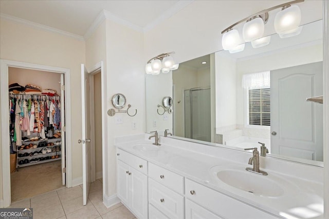 2977 William Few Pkwy, Evans, GA 30809 - full bathroom featuring a stall shower, a spacious closet, crown molding, tile patterned flooring, and double vanity