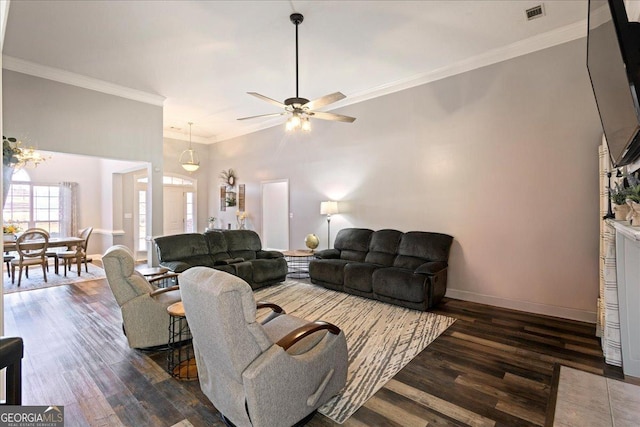 2977 William Few Pkwy, Evans, GA 30809 - living room with dark wood-style flooring, crown molding, baseboards, and a ceiling fan