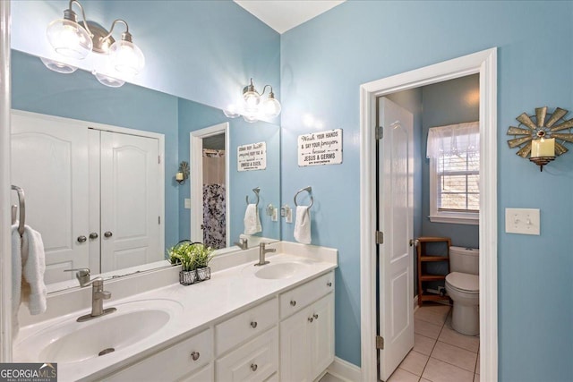 2977 William Few Pkwy, Evans, GA 30809 - full bathroom featuring double vanity, tile patterned flooring, and toilet