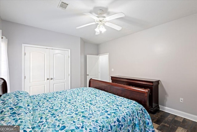 2977 William Few Pkwy, Evans, GA 30809 - bedroom featuring dark wood-type flooring, baseboards, a closet, and a ceiling fan