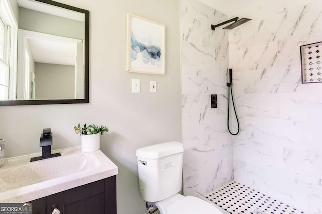 2343 Dawn Dr, Decatur, GA 30032 - full bathroom featuring a marble finish shower, vanity, and toilet