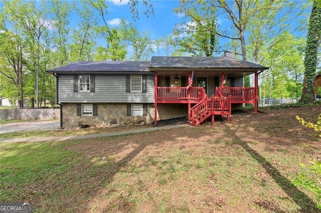 230 Oakridge Dr SE, Cartersville, GA 30121 - view of front facade featuring a porch, stairway, and a chimney