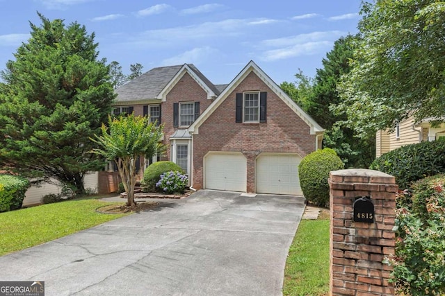 4815 Rapids Cir NW, Acworth, GA 30102 - view of front of property with brick siding, driveway, and a garage