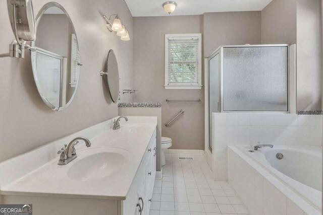 4815 Rapids Cir NW, Acworth, GA 30102 - bathroom with a stall shower, tile patterned floors, a bath, and double vanity