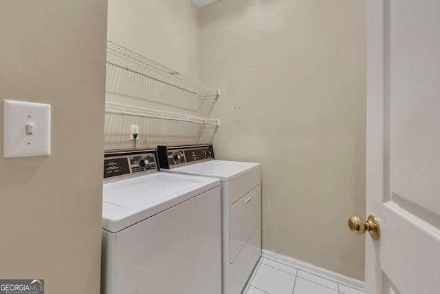 4815 Rapids Cir NW, Acworth, GA 30102 - washroom with washing machine and dryer and light tile patterned floors