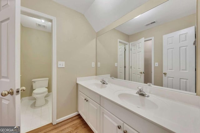 4815 Rapids Cir NW, Acworth, GA 30102 - bathroom featuring double vanity and wood finished floors