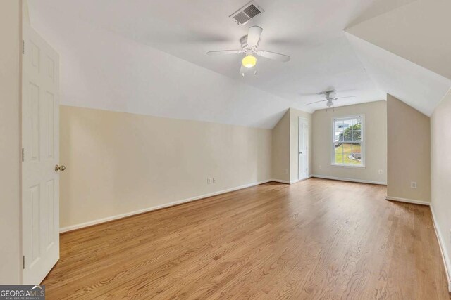 4815 Rapids Cir NW, Acworth, GA 30102 - additional living space with ceiling fan, wood finished floors, and vaulted ceiling