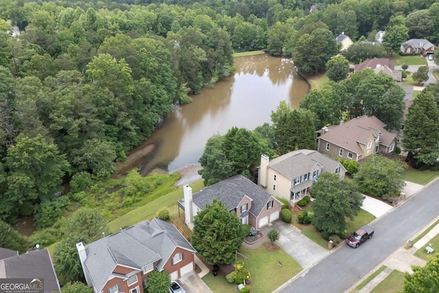 4815 Rapids Cir NW, Acworth, GA 30102 - aerial view of residential area with a nearby body of water and a heavily wooded area