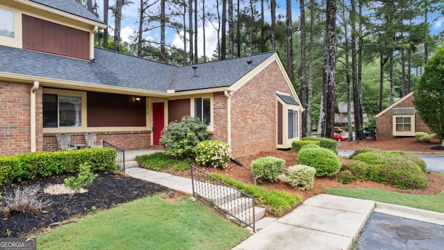 49 Country Ct, Alpharetta, GA 30005 - view of front facade featuring brick siding and roof with shingles