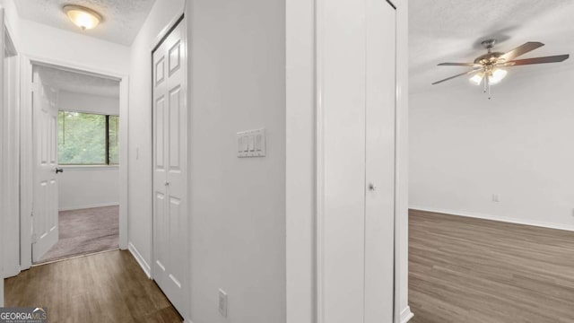 49 Country Ct, Alpharetta, GA 30005 - hall featuring dark wood-style flooring and a textured ceiling