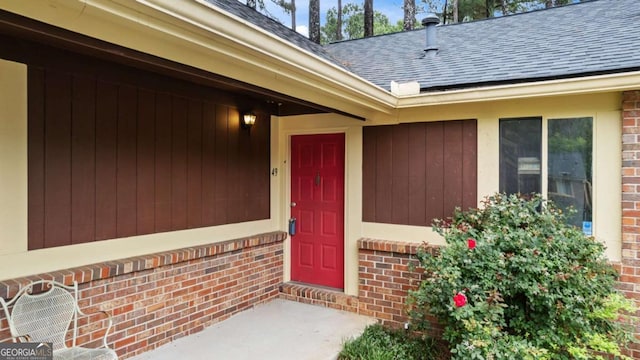 49 Country Ct, Alpharetta, GA 30005 - view of exterior entry with roof with shingles and brick siding