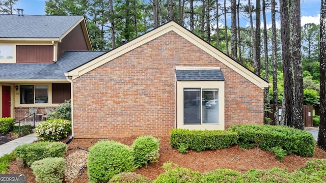 49 Country Ct, Alpharetta, GA 30005 - view of property exterior with brick siding and roof with shingles