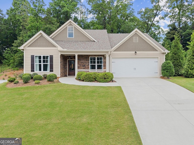 3521 Phoenix Cove Dr, Gainesville, GA 30506 - craftsman inspired home with a front lawn, covered porch, a garage, driveway, and stone siding